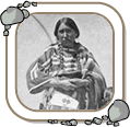 Blackfoot women in front of tipi.