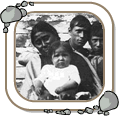 Metis family at Fort Chipewyan, Alberta, ca. 1899. During Treaty #8 expedition.